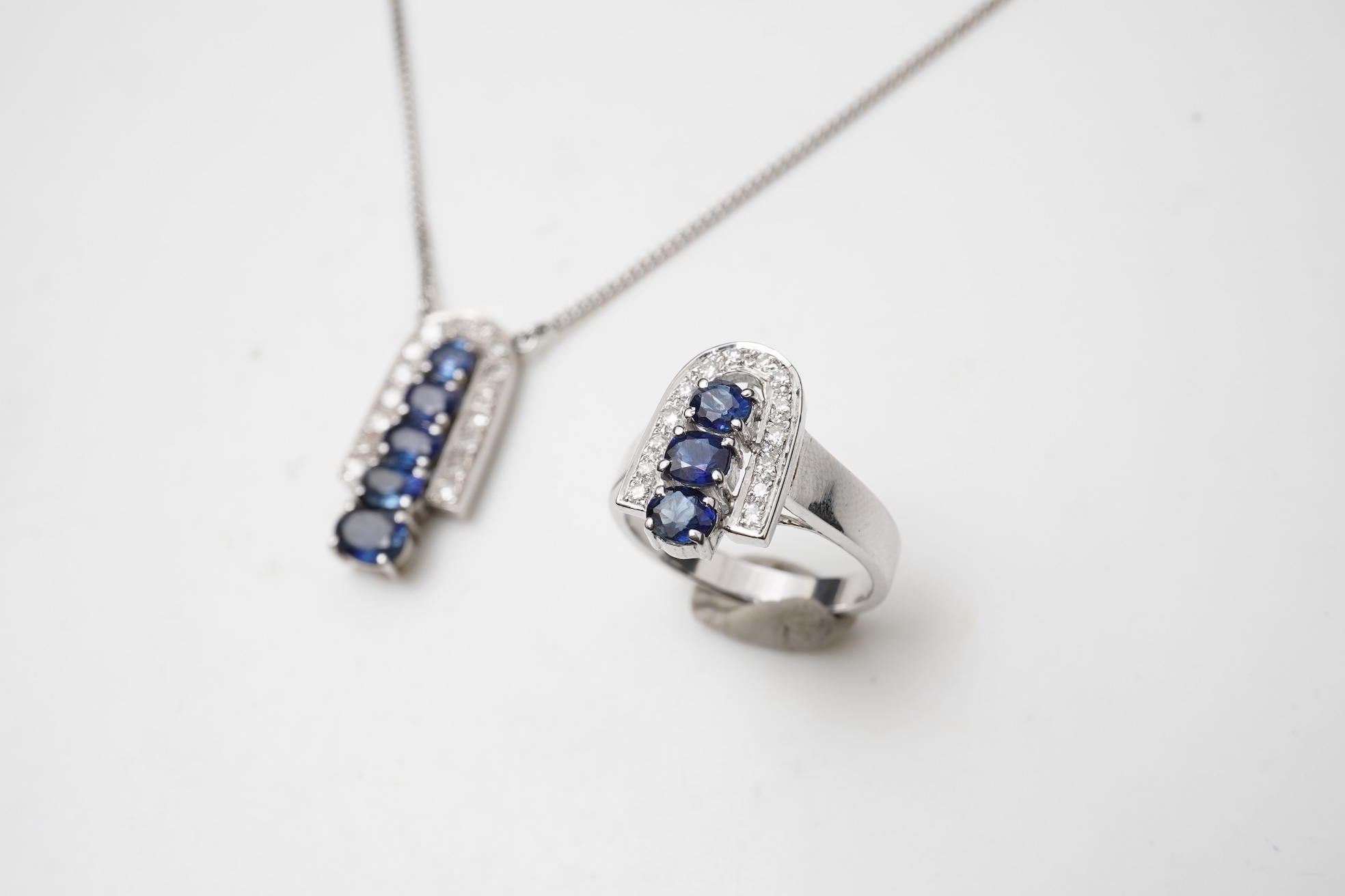 A sapphire and diamond demi-parure